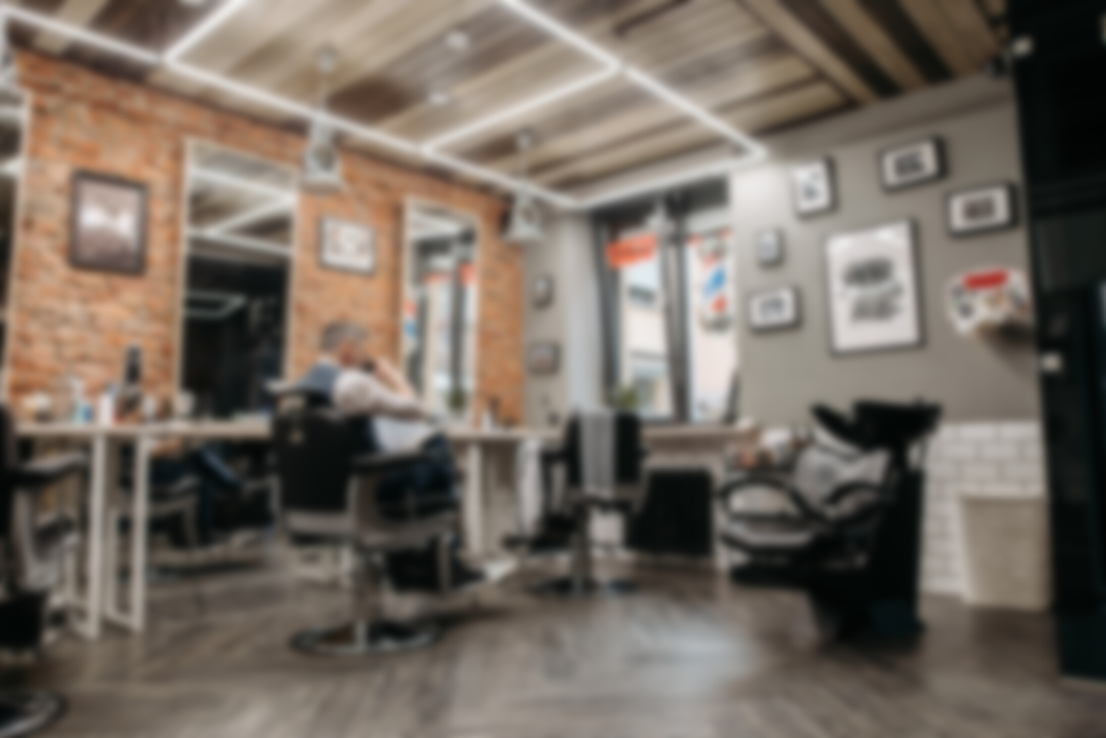 Man Sitting on a Barber Chair